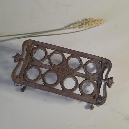 Rustic brown cast iron garden cuttings holder - it will need glass test tubes